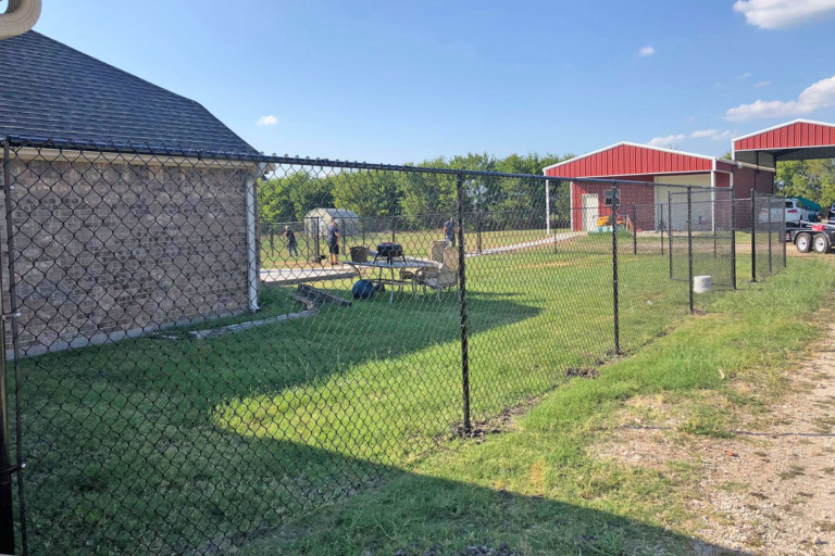 Installing a new chain link fence in Nevada, Texas