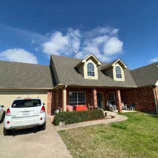New roof and gutters in Caddo Mills, Northeast Texas.