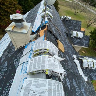 New roof and gutters in Caddo Mills, Northeast Texas.