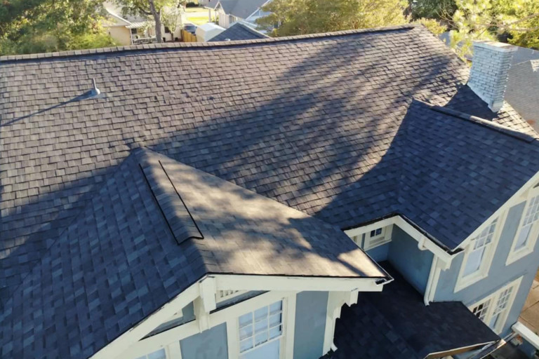 Installing a new roof on a historic home in Greenville, Texas