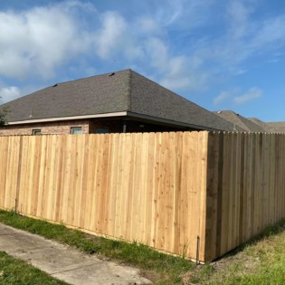 Installing a new wood fence in Greenville, Texas
