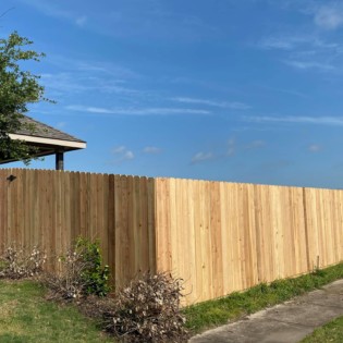 Installing a new wood fence in Greenville, Texas