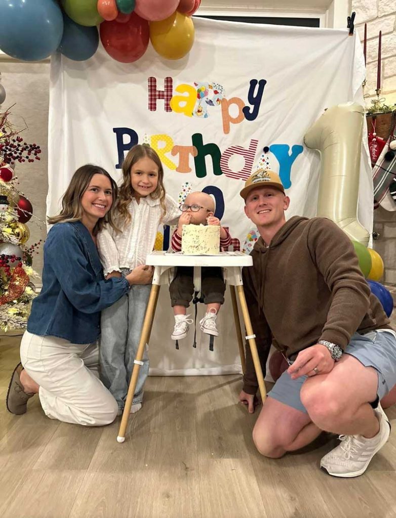 Trey Walden and his family at a child's birthday celebration