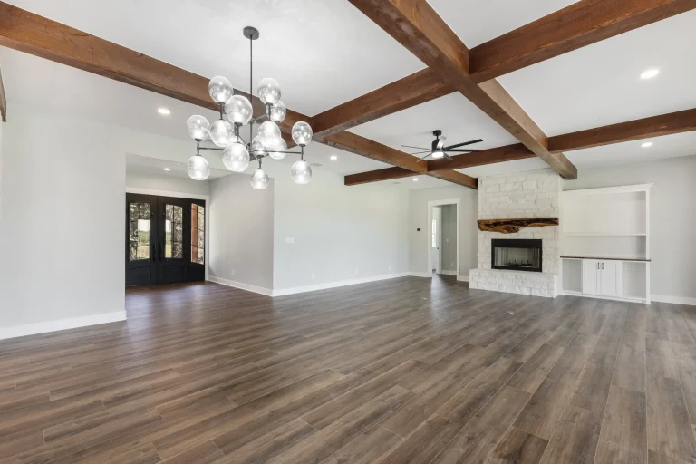 Dining area with beamed ceiling and chandelier