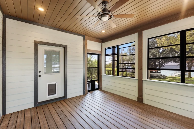 Screened porch room with wood floors and a wood ceiling