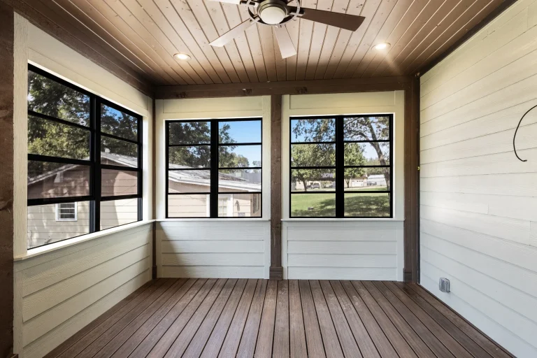 Screened porch with black-framed windows